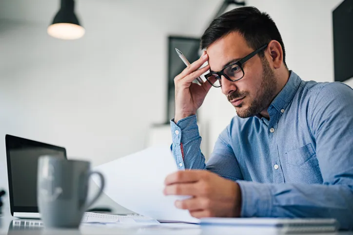 Man working on accounting documents